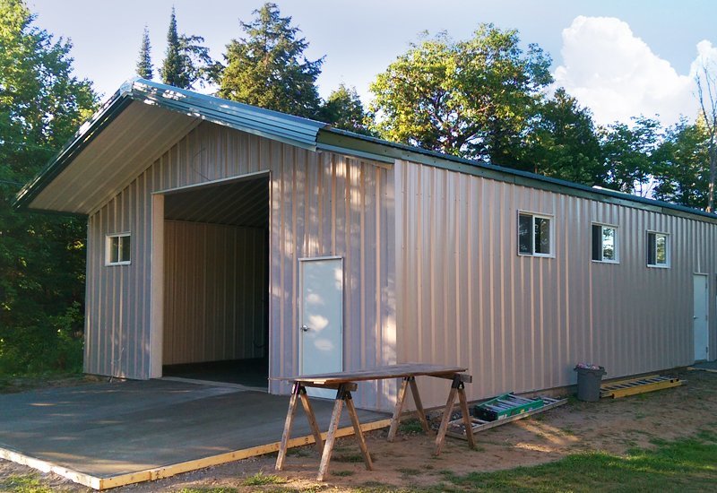 Prefab steel residential garage and shop with overhang