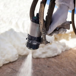 Spray foam insulation being applied